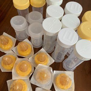 Lot of Graduated Bottles, Slow Flow Nipples, and Bottle Cooler - Medela